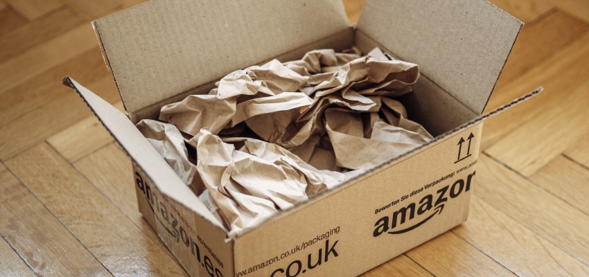 Opened parcel from Amazon on home parquet floor